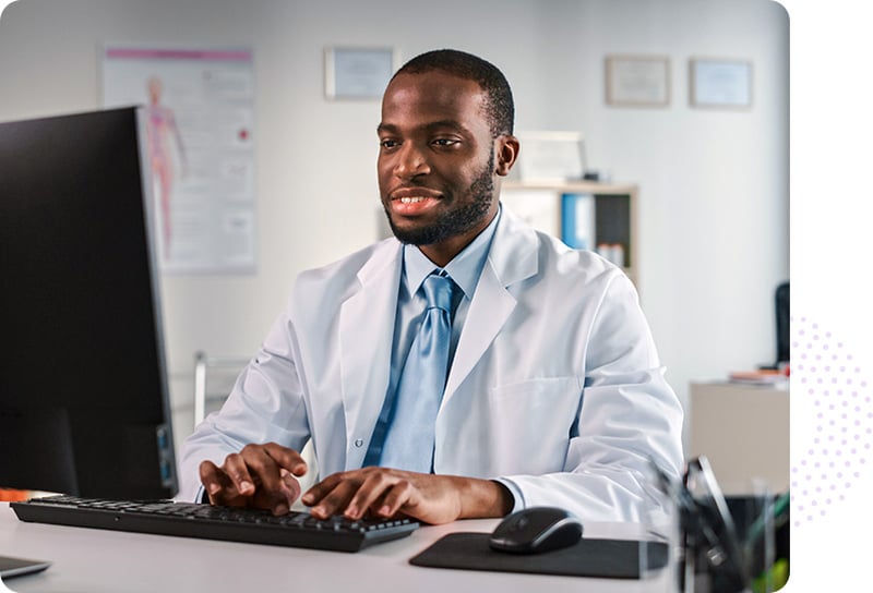 Clinical pharmacist reviewing data reports