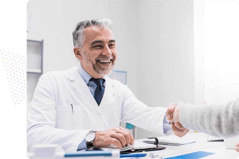 Clinical pharmacist shaking hands