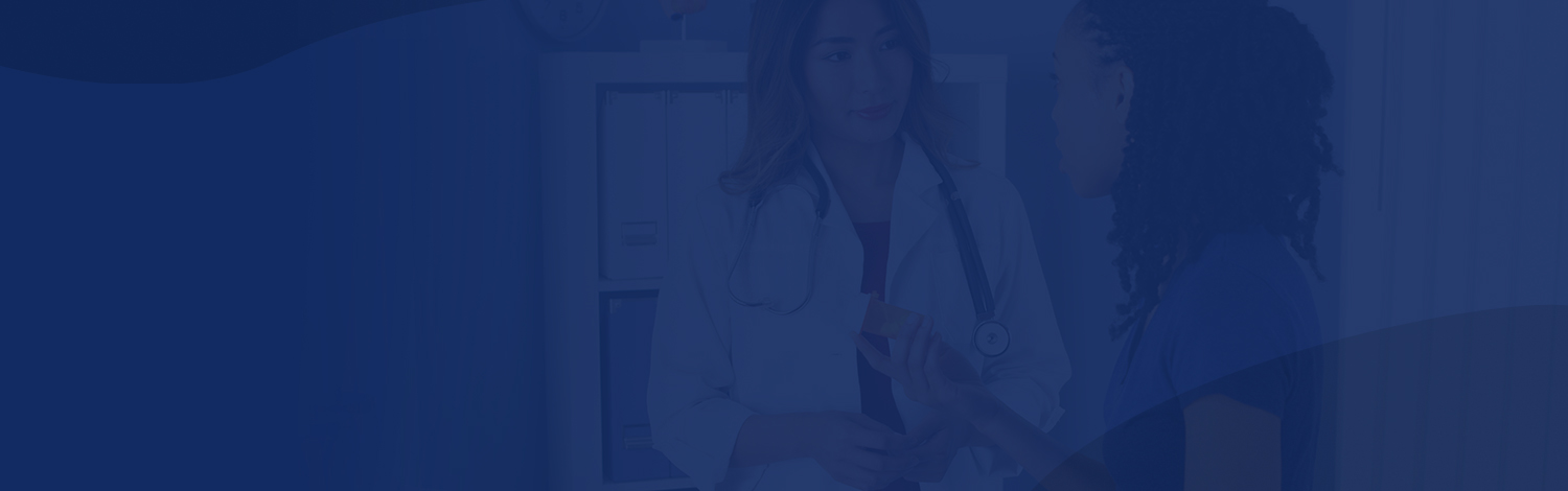 Physician explaining new prescription to patient